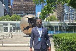 Mfikela Jean Samuel during an international public engagement