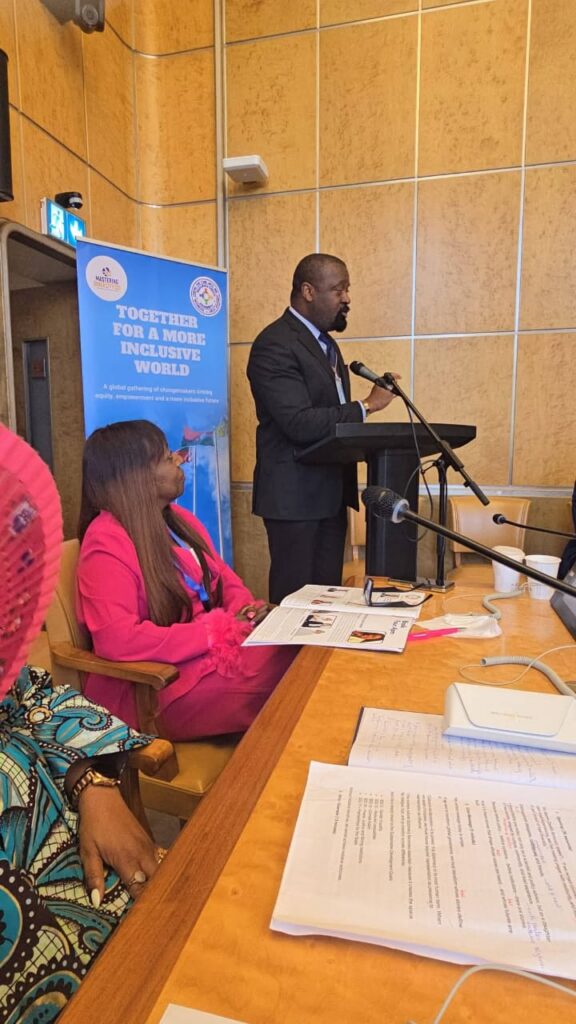 Mfikela Jean Samuel speaking at an event